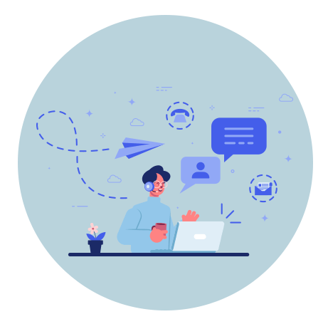 A man is sitting at a desk using a laptop computer.